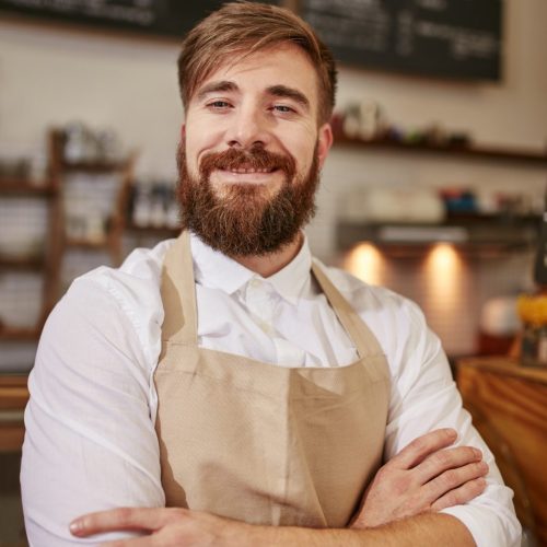 happy-young-barista-at-work-e1641582557351.jpg